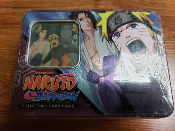 Naruto vs Sasuke Tin - Fierce Ambitions - Set 15 & 16 - 4 Booster Packs (2 Broken Promise, 2 Foretold Prophecy) - Naruto CCG Card Game - Sealed