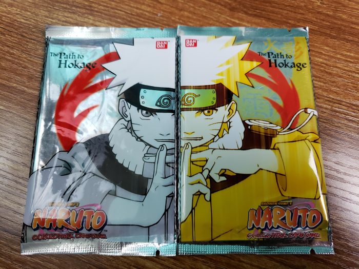 The Path to Hokage - Set 1 - Booster Pack Art Set x1 (2 Packs) - 1 Silver & 1 Gold Naruto Art - Naruto CCG Card Game - Sealed